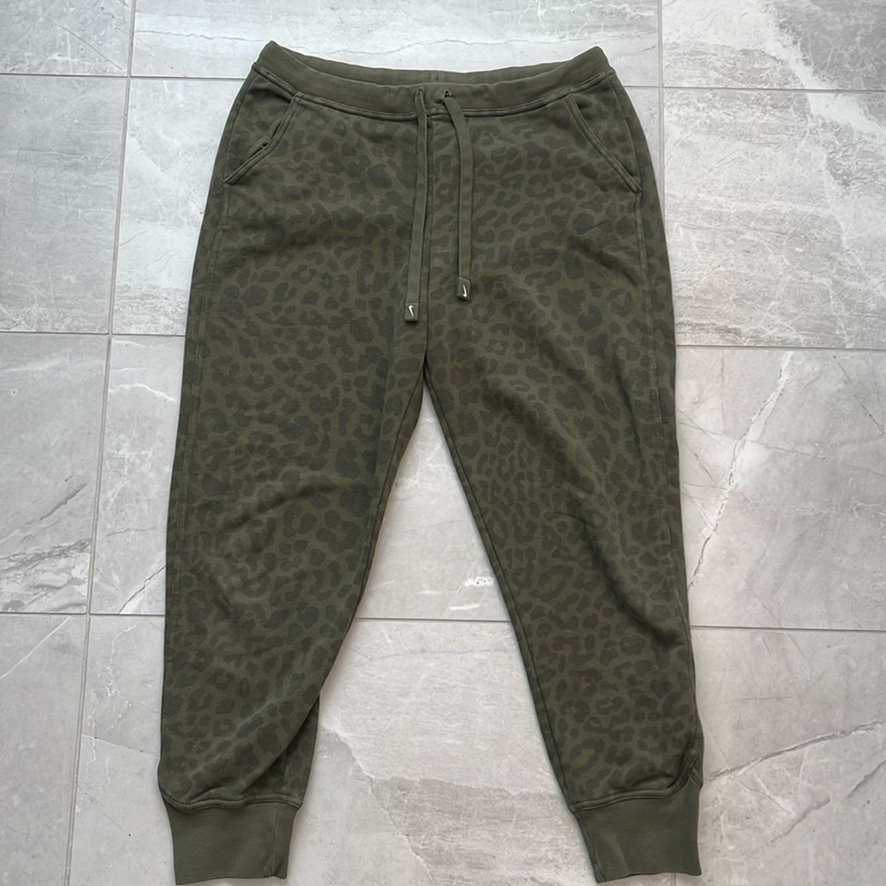 Army green nike womans sweat pants with leopard print medium size